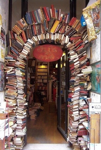 Photo:  archway built completely from books
